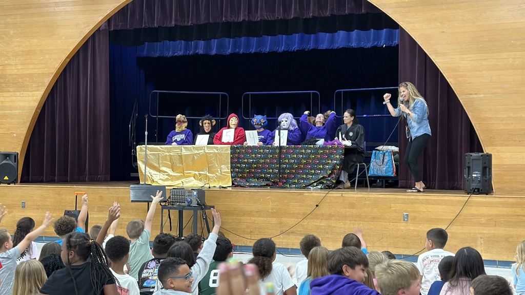 We debuted our very first Masked Reader event this week, and the energy in the gym was electric! Our students turned into mini-detectives, listening for clues and trying to guess which of their favorite teachers were hidden behind those wild costumes. There is nothing quite like the mystery of a good book—or a mysterious reader! Thank you to our brave staff for being such good sports and making reading the highlight of our day.