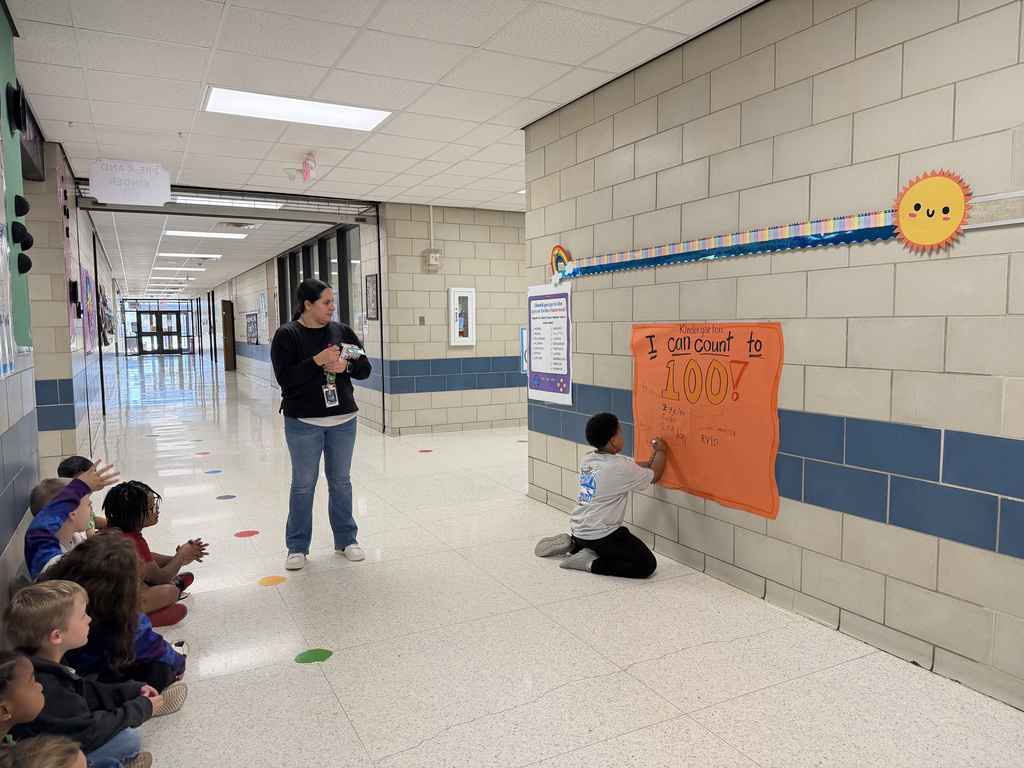 Stop and give a round of applause for our newest math superstars! 👏💯  Mrs. Arias’ kindergarteners have been working so hard on their numbers, and we are officially celebrating the students who have conquered the challenge of counting all the way to 100!  There is nothing quite like the pride of getting to sign your name on the big orange poster for the whole school to see. Way to go, little Wildcats! We are so proud of your hard work and persistence. 🌟