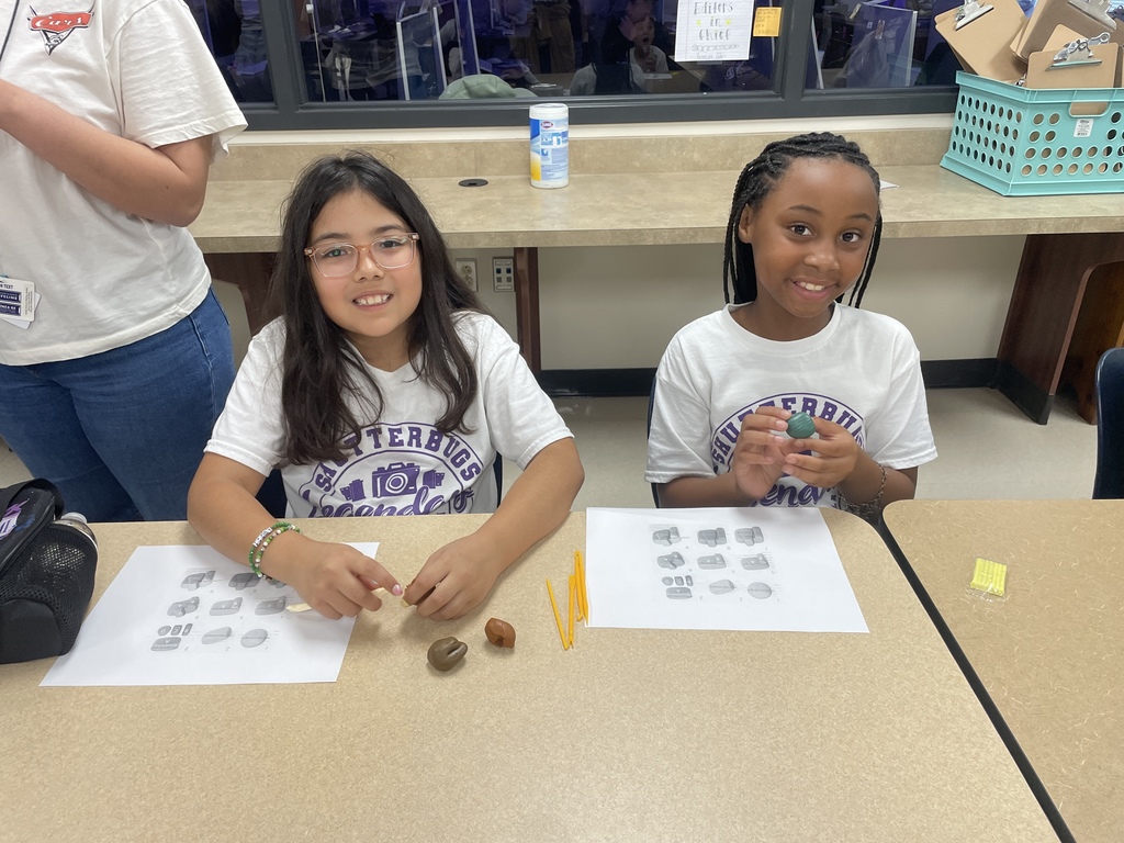 From vintage lenses to future layouts! Our Shutterbugs took a deep dive into the history of our community and craft during their recent trip to the History Center.  A massive thank you to Mrs. Winder for being such an incredible host! She opened up the archives, allowing our students to get hands-on with old camera equipment and explore the fascinating history of Angleton ISD.  We also got a "sneak peek" at the big leagues by visiting the High School yearbook staff and Mrs. Evans! Seeing where their photography journey can lead was so inspiring. Of course, no Shutterbugs trip is complete without a little fieldwork—the students took a creative break outside to practice their angles and capture the beauty of the day.