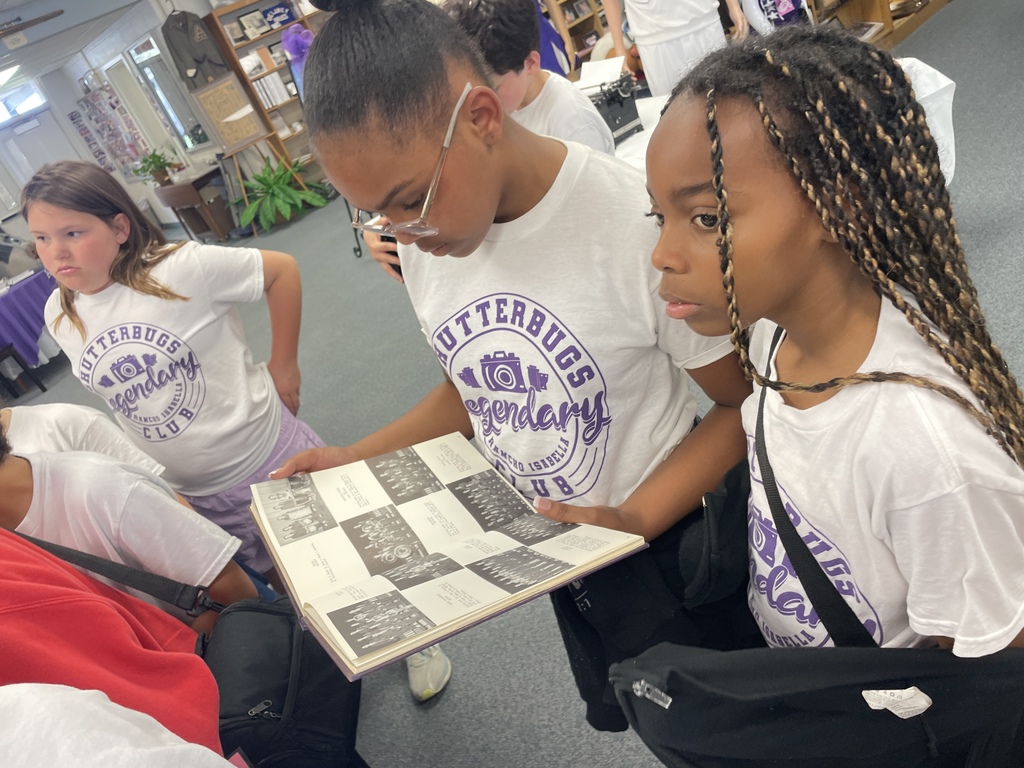 From vintage lenses to future layouts! Our Shutterbugs took a deep dive into the history of our community and craft during their recent trip to the History Center.  A massive thank you to Mrs. Winder for being such an incredible host! She opened up the archives, allowing our students to get hands-on with old camera equipment and explore the fascinating history of Angleton ISD.  We also got a "sneak peek" at the big leagues by visiting the High School yearbook staff and Mrs. Evans! Seeing where their photography journey can lead was so inspiring. Of course, no Shutterbugs trip is complete without a little fieldwork—the students took a creative break outside to practice their angles and capture the beauty of the day.