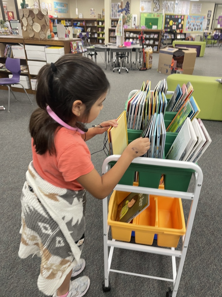 Big things are happening in our library! We are so excited to introduce our brand-new VOX Books! These "books that talk" allow our students to listen to a professional narration while they follow along with the physical pages, helping to boost literacy and confidence.  This was made possible through a wonderful partnership between Mrs. Kluttz and our Librarian, Mrs. Powell, who successfully applied for a grant through the Education Foundation.  Check out these photos from our "Launch Day!" A few lucky students were selected to be our "First Listeners" and official product testers. From the smiles on their faces, we think these books are going to be a huge hit!