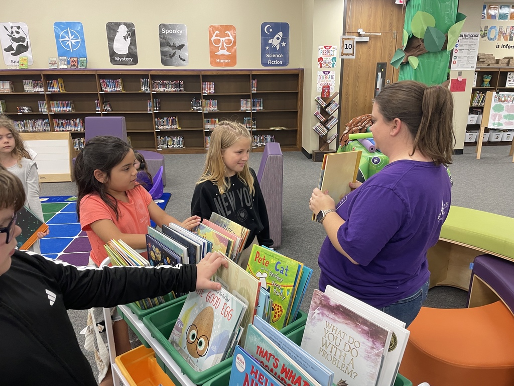 Big things are happening in our library! We are so excited to introduce our brand-new VOX Books! These "books that talk" allow our students to listen to a professional narration while they follow along with the physical pages, helping to boost literacy and confidence.  This was made possible through a wonderful partnership between Mrs. Kluttz and our Librarian, Mrs. Powell, who successfully applied for a grant through the Education Foundation.  Check out these photos from our "Launch Day!" A few lucky students were selected to be our "First Listeners" and official product testers. From the smiles on their faces, we think these books are going to be a huge hit!