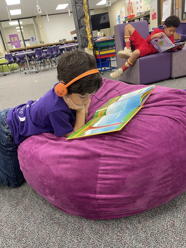 Big things are happening in our library! We are so excited to introduce our brand-new VOX Books! These "books that talk" allow our students to listen to a professional narration while they follow along with the physical pages, helping to boost literacy and confidence.  This was made possible through a wonderful partnership between Mrs. Kluttz and our Librarian, Mrs. Powell, who successfully applied for a grant through the Education Foundation.  Check out these photos from our "Launch Day!" A few lucky students were selected to be our "First Listeners" and official product testers. From the smiles on their faces, we think these books are going to be a huge hit!