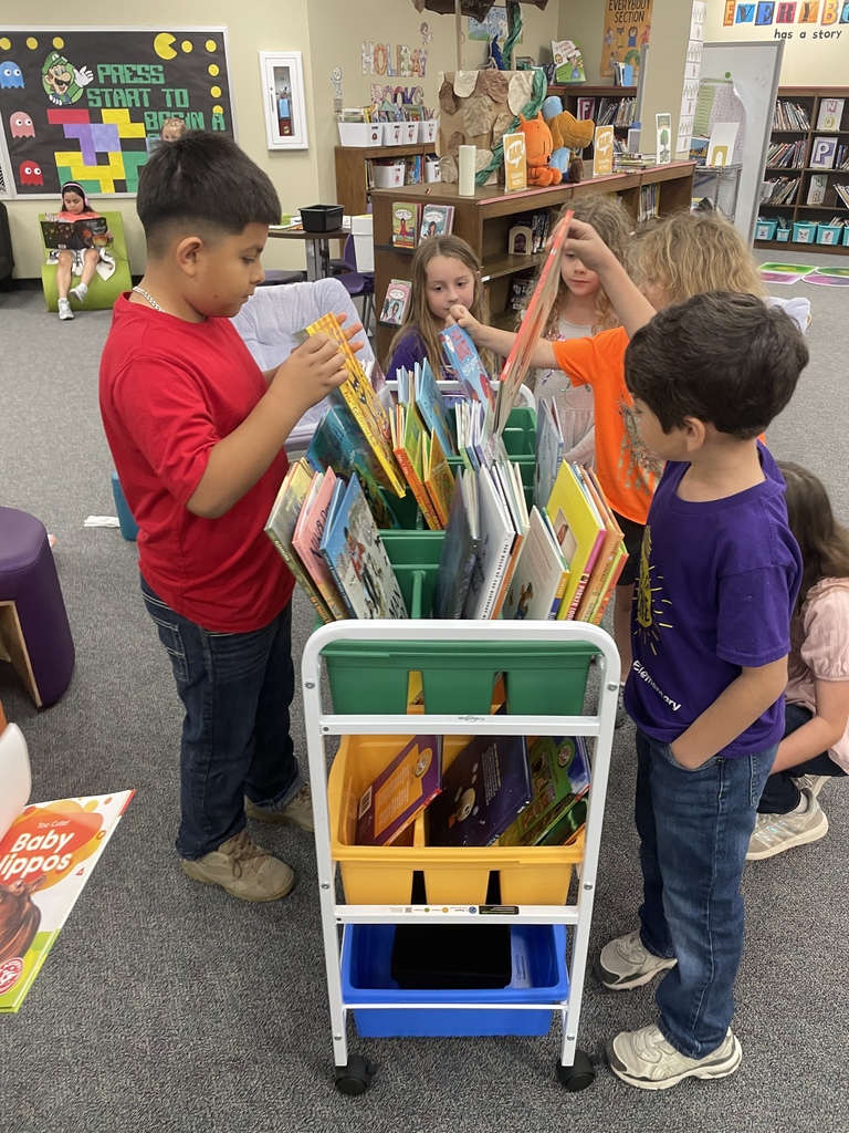 Big things are happening in our library! We are so excited to introduce our brand-new VOX Books! These "books that talk" allow our students to listen to a professional narration while they follow along with the physical pages, helping to boost literacy and confidence.  This was made possible through a wonderful partnership between Mrs. Kluttz and our Librarian, Mrs. Powell, who successfully applied for a grant through the Education Foundation.  Check out these photos from our "Launch Day!" A few lucky students were selected to be our "First Listeners" and official product testers. From the smiles on their faces, we think these books are going to be a huge hit!