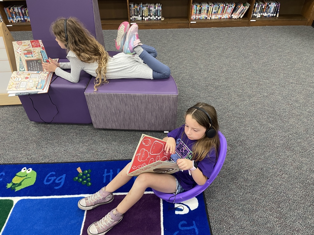 Big things are happening in our library! We are so excited to introduce our brand-new VOX Books! These "books that talk" allow our students to listen to a professional narration while they follow along with the physical pages, helping to boost literacy and confidence.  This was made possible through a wonderful partnership between Mrs. Kluttz and our Librarian, Mrs. Powell, who successfully applied for a grant through the Education Foundation.  Check out these photos from our "Launch Day!" A few lucky students were selected to be our "First Listeners" and official product testers. From the smiles on their faces, we think these books are going to be a huge hit!