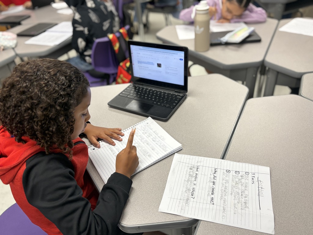 Big ideas start with a rough draft! Mrs. Monroe’s 5th graders are diving deep into expository writing, researching and drafting essays on their favorite inventions. From everyday essentials like football and DVDs to fun favorites like squishies, these students are putting serious focus into organizing their facts and sharing what makes these creations unique. Way to go, 5th grade!