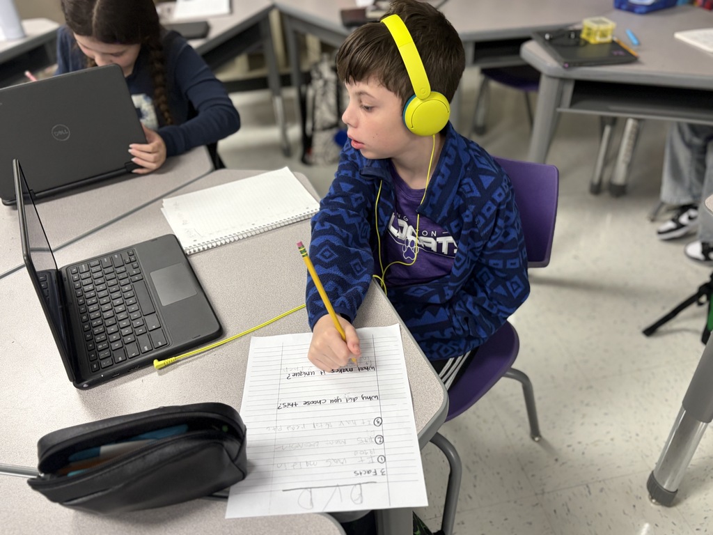 Big ideas start with a rough draft! Mrs. Monroe’s 5th graders are diving deep into expository writing, researching and drafting essays on their favorite inventions. From everyday essentials like football and DVDs to fun favorites like squishies, these students are putting serious focus into organizing their facts and sharing what makes these creations unique. Way to go, 5th grade!