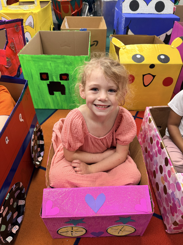 Our Pre-K students finished up their box unit in the most creative way possible! The kids brought their hand-crafted cardboard cars to class and parked them in the classroom for a special drive-in movie day. We love seeing their big smiles and incredible imaginations come to life!