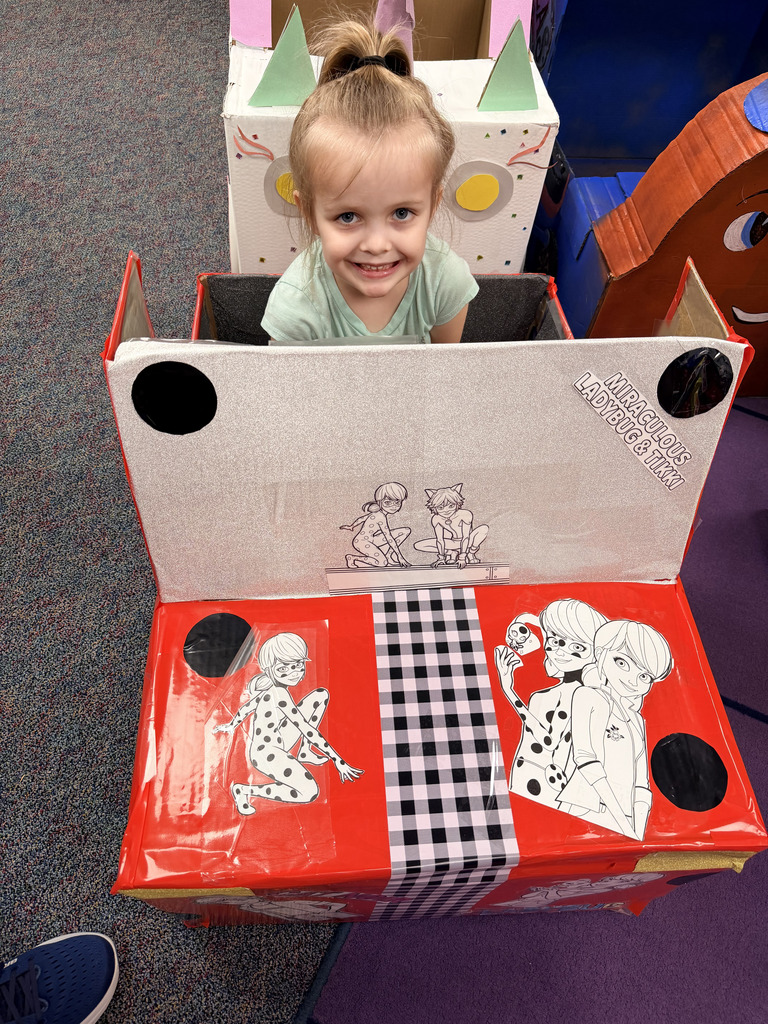Our Pre-K students finished up their box unit in the most creative way possible! The kids brought their hand-crafted cardboard cars to class and parked them in the classroom for a special drive-in movie day. We love seeing their big smiles and incredible imaginations come to life!