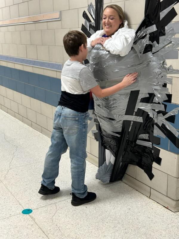 When we say we stick together to hit our goals, we mean it! Huge thanks to our amazing principal for being such a good sport today—because we reached our fundraising goal, students got to duct-tape her to the wall! We love seeing our school community come together to support our students.