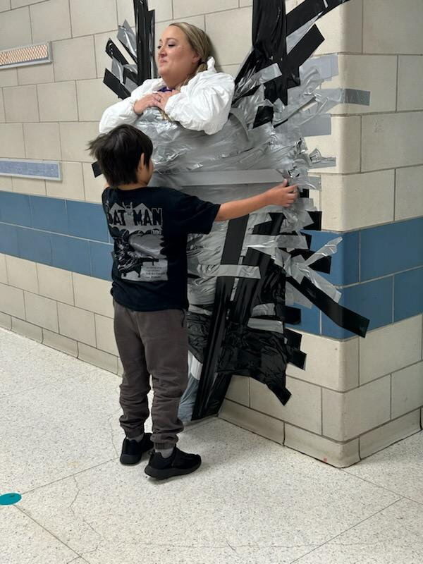 When we say we stick together to hit our goals, we mean it! Huge thanks to our amazing principal for being such a good sport today—because we reached our fundraising goal, students got to duct-tape her to the wall! We love seeing our school community come together to support our students.