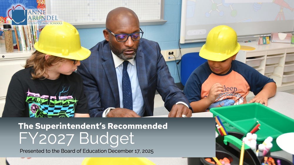 Superintendent of Schools Dr. Mark Bedell with students