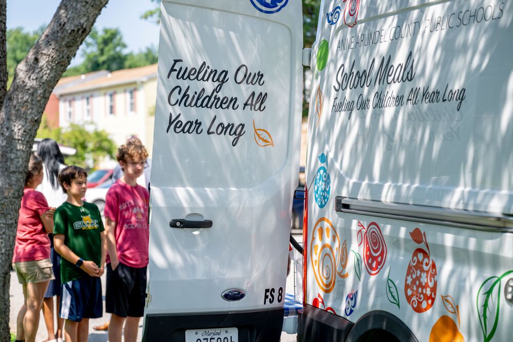 Children getting summer meals