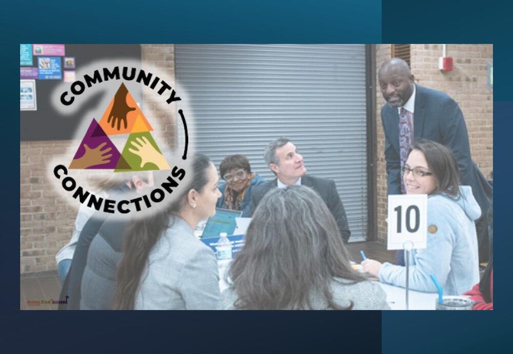Dr. Bedell listens to a group discuss issues facing the school system