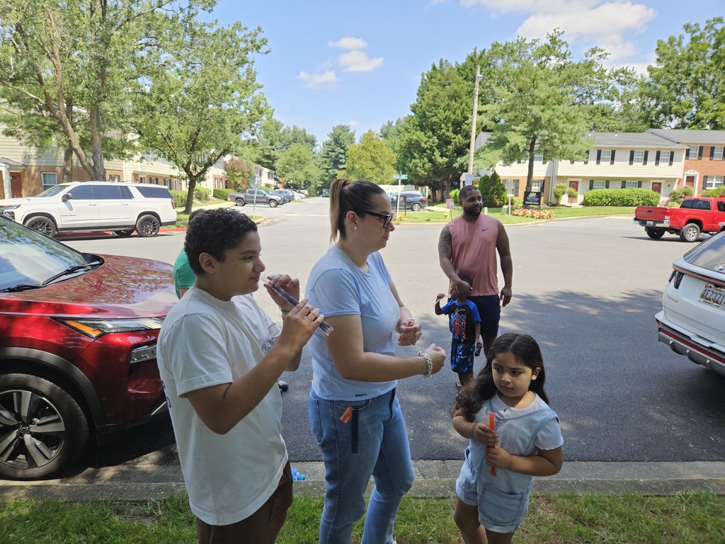 families enjoying popsicles