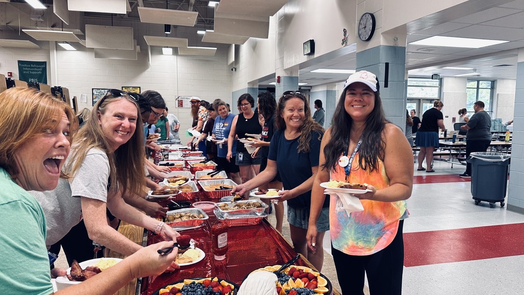 Teachers enjoying breakfast