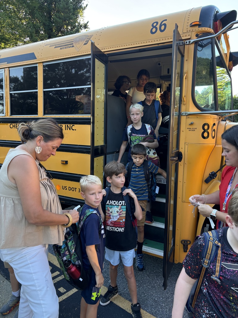 Students coming off bus