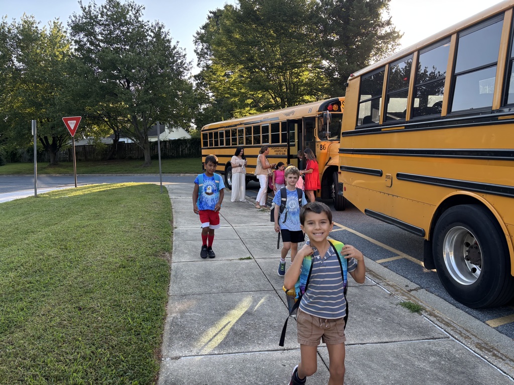 Students unloading from bus