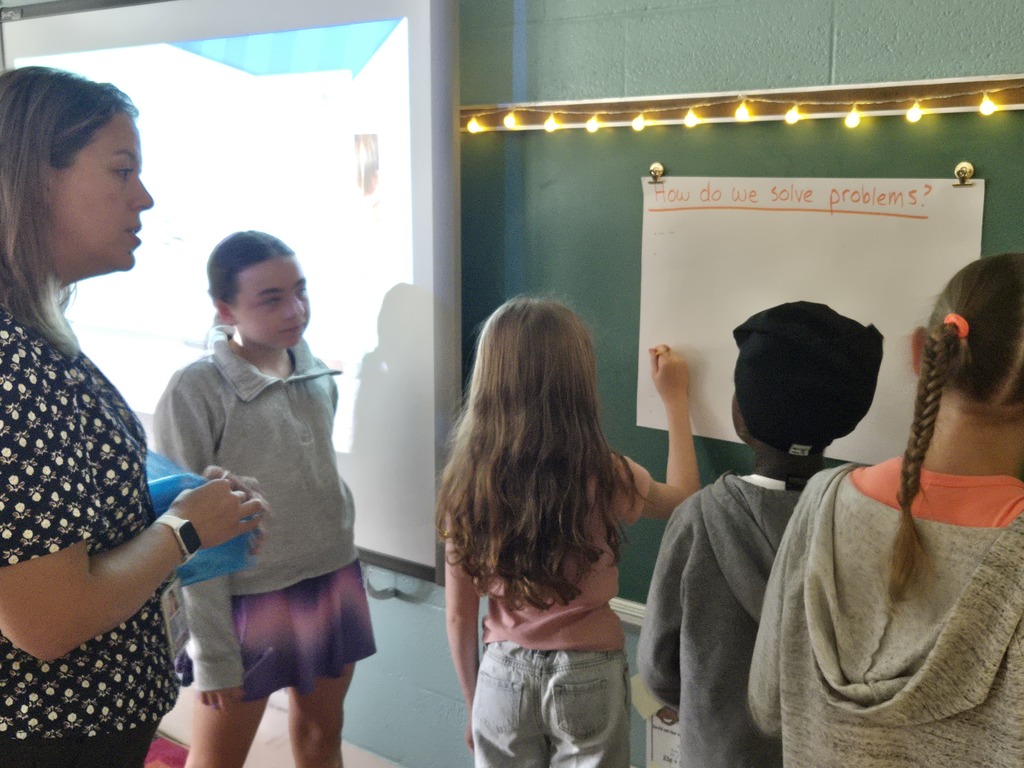 Students solving problem in a group