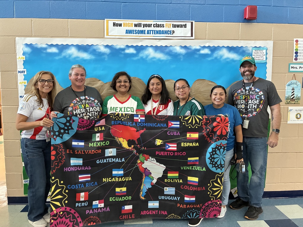 Staff members with shirts