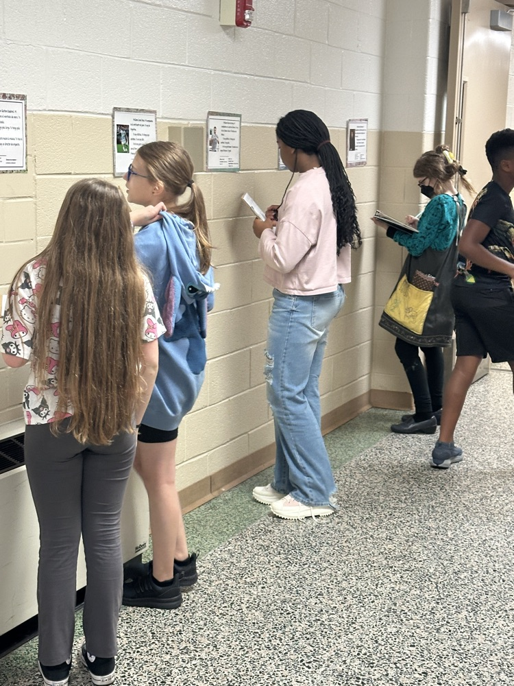 students working in hallway