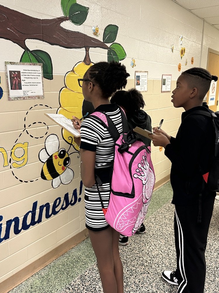 students working in hallway