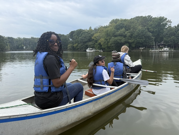 students in canoe