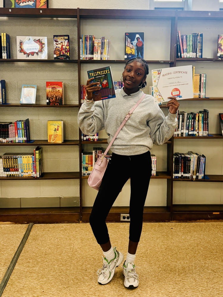 student with certificate and free book 