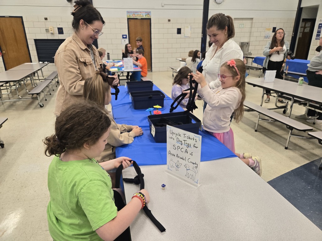 Parents and students making dog toys
