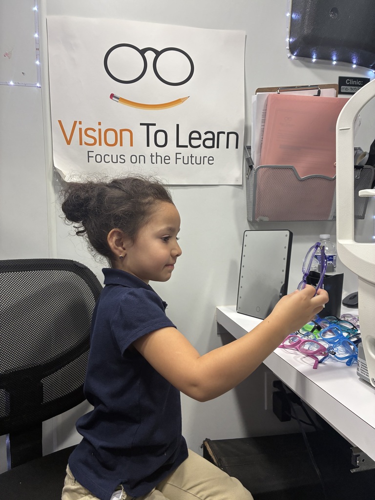Student selecting eye glasses