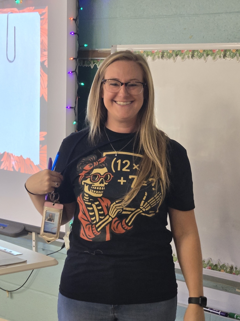 Woman wearing a shirt with an equation.