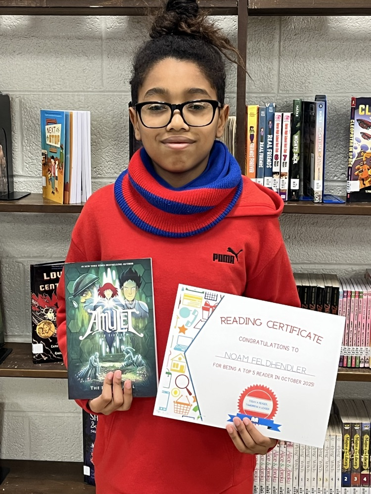 reader with his certificate and free book