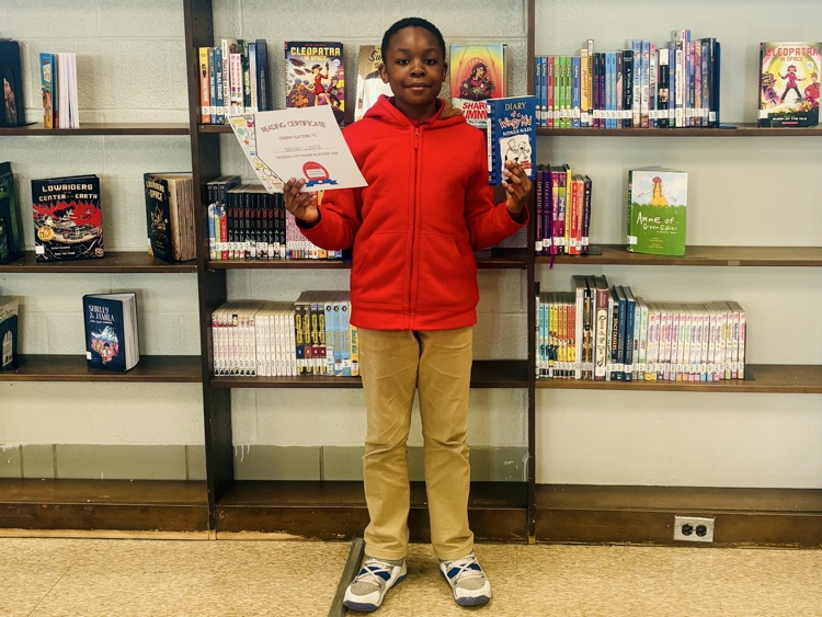 reader with his certificate and free book