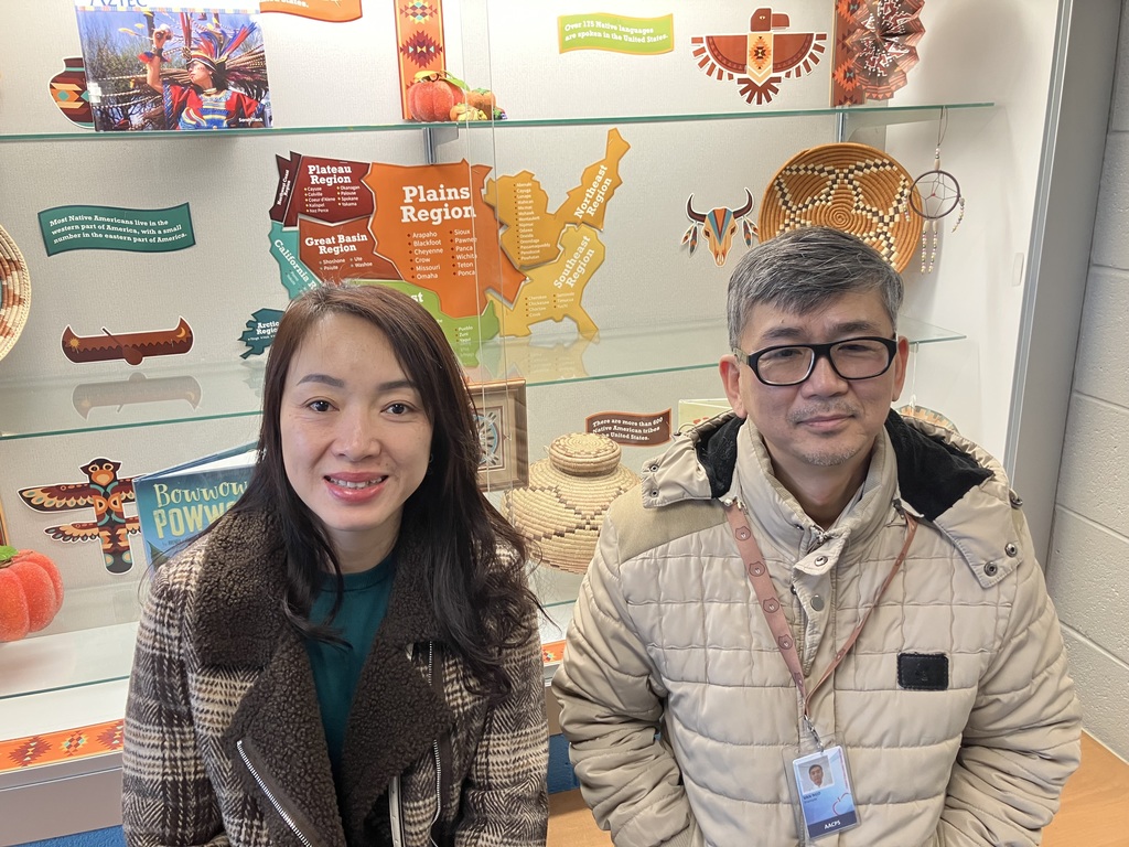 Bilingual Facilitators Angela Nambiar and Van Ngo Work together to support and welcome a brand new Quarterfield elementary student.