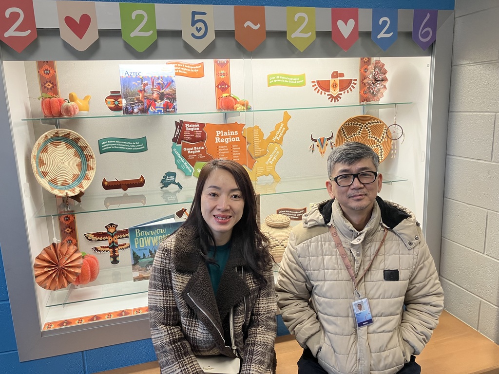 Bilingual Facilitators Angela Nambiar and Van Ngo Work together to support and welcome a brand new Quarterfield elementary student.