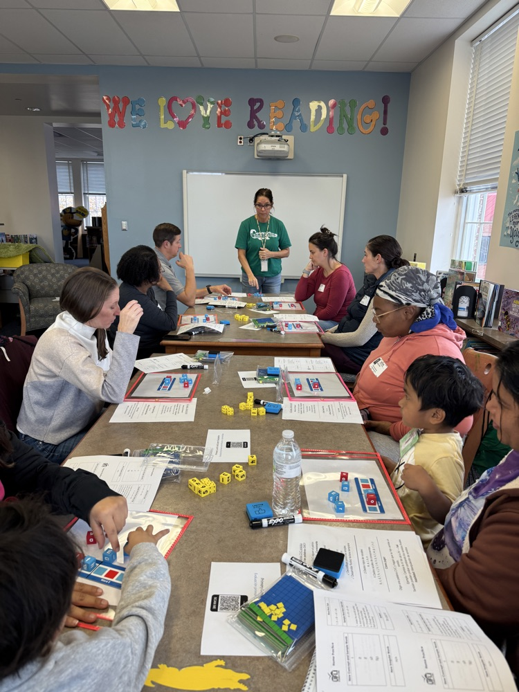 parents reading CVC words during a workshop