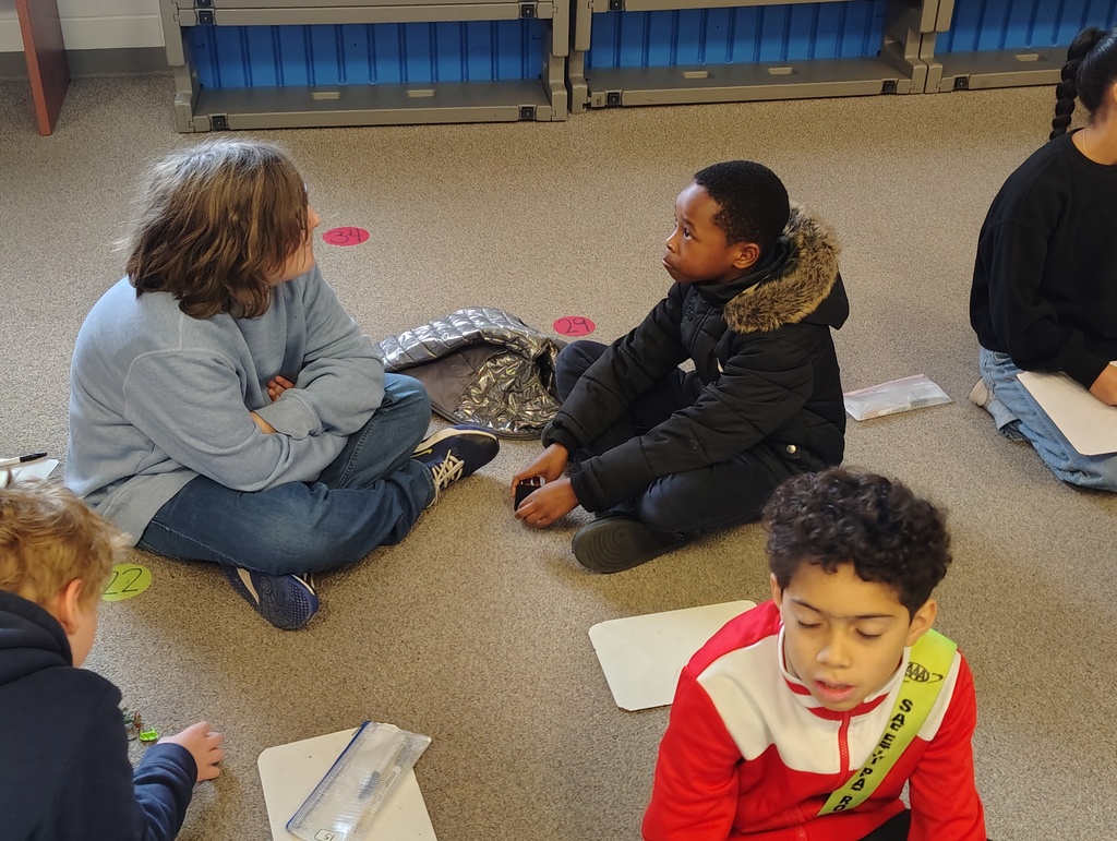 Students turned together, talking