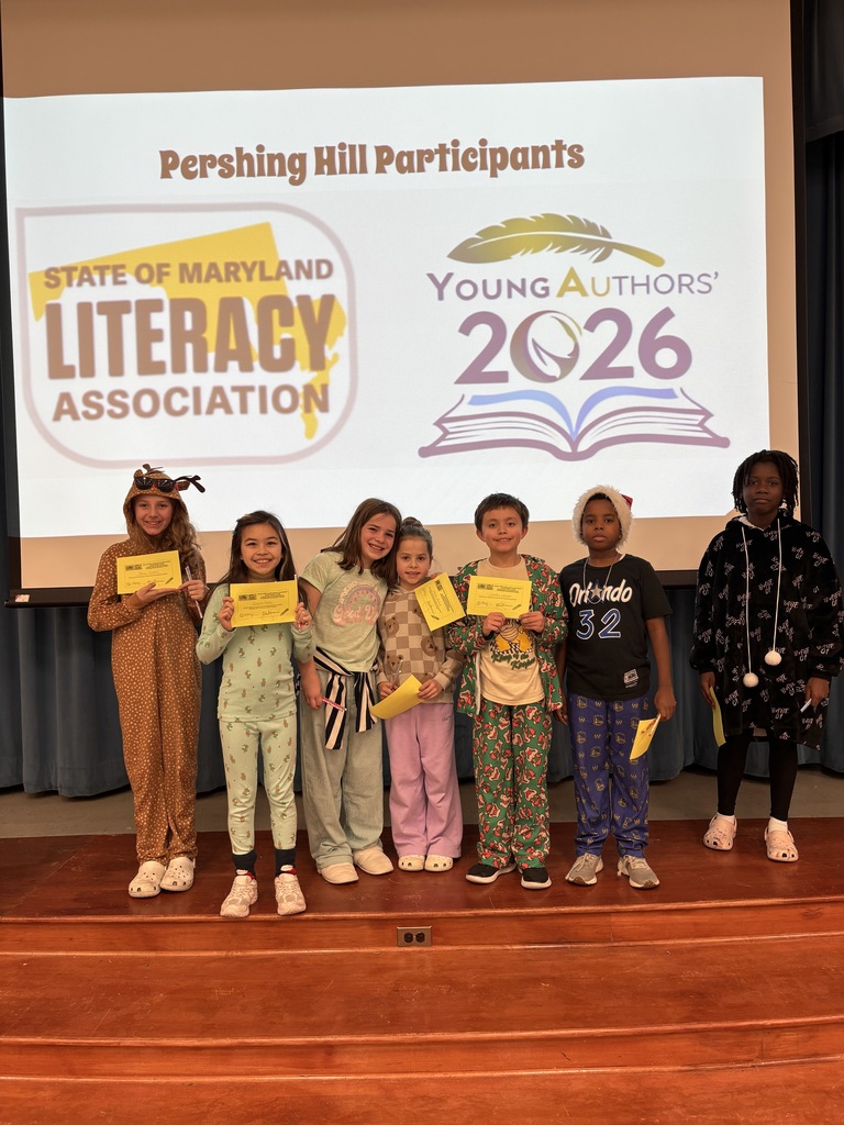 Students holding participant certificates. 