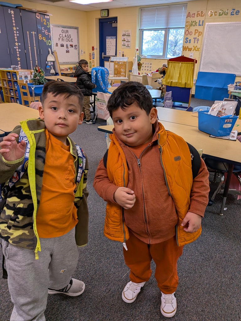 Boys in orange clothes