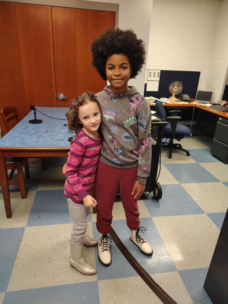 The two students who made it to the final round took a picture together