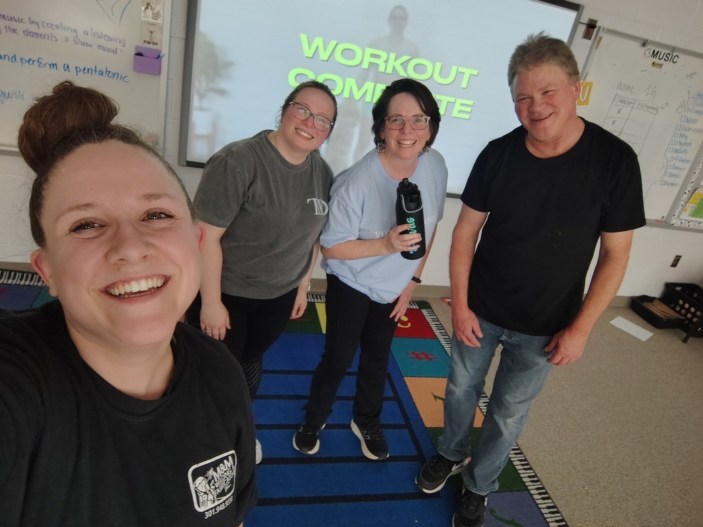 4 staff members take a post workout selfie!
