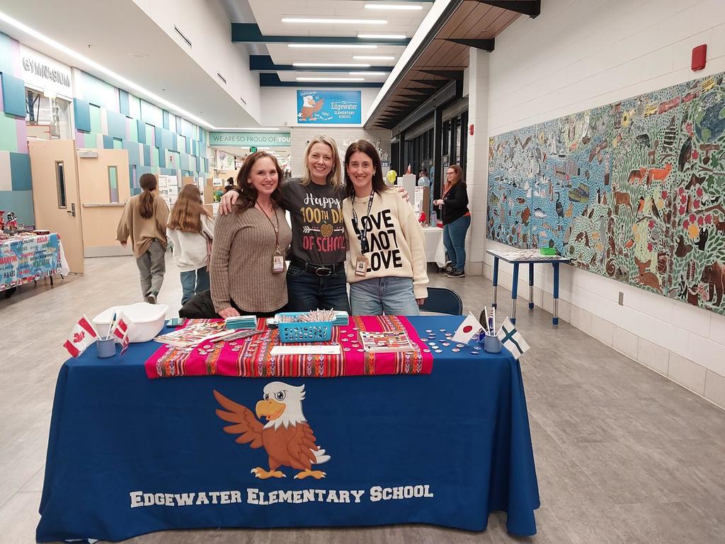 Staff at the welcome table for the  Edgewater Elementary International Night.  