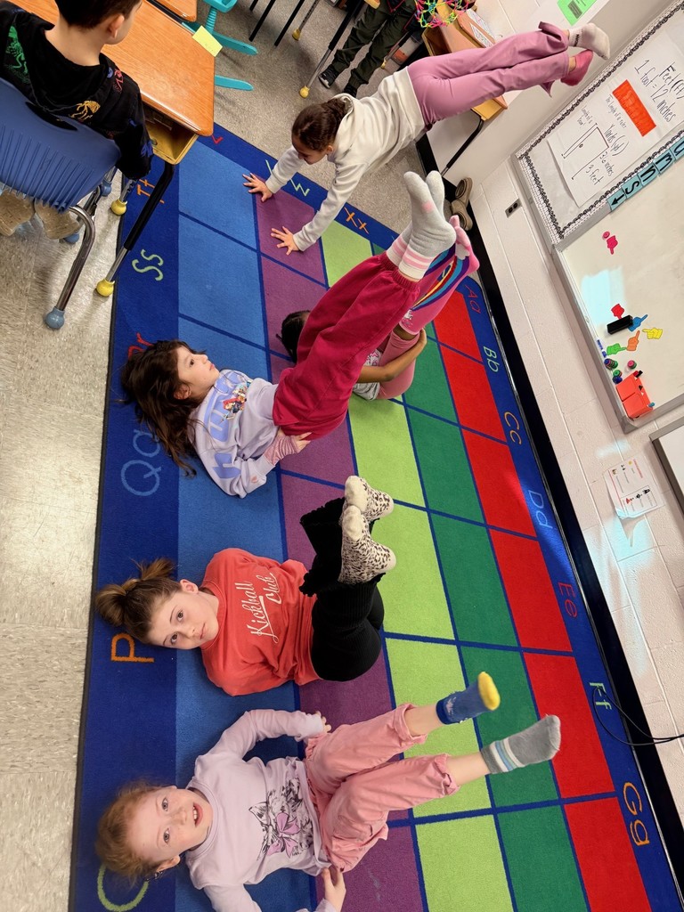 The girls doing tricks in their silly socks