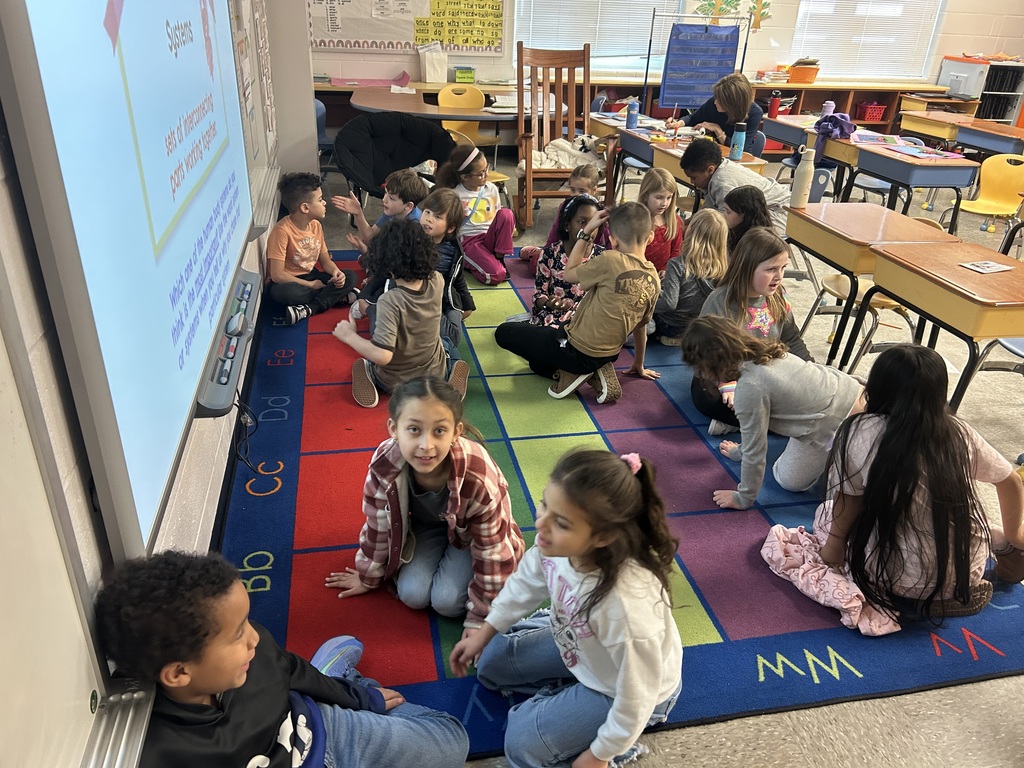 Students doing a turn and talk during a knowledge lesson. 