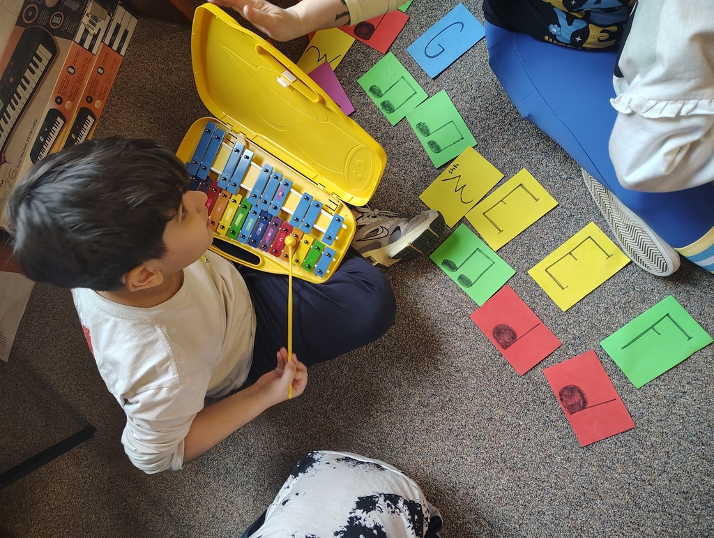 students, white boards, music notation