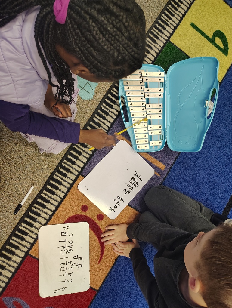 students, white boards, music notation