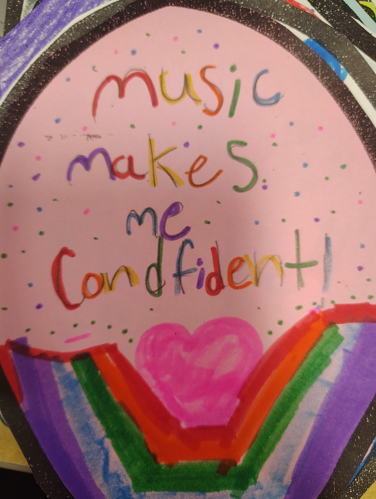 a flower petal that says "music makes me confident"