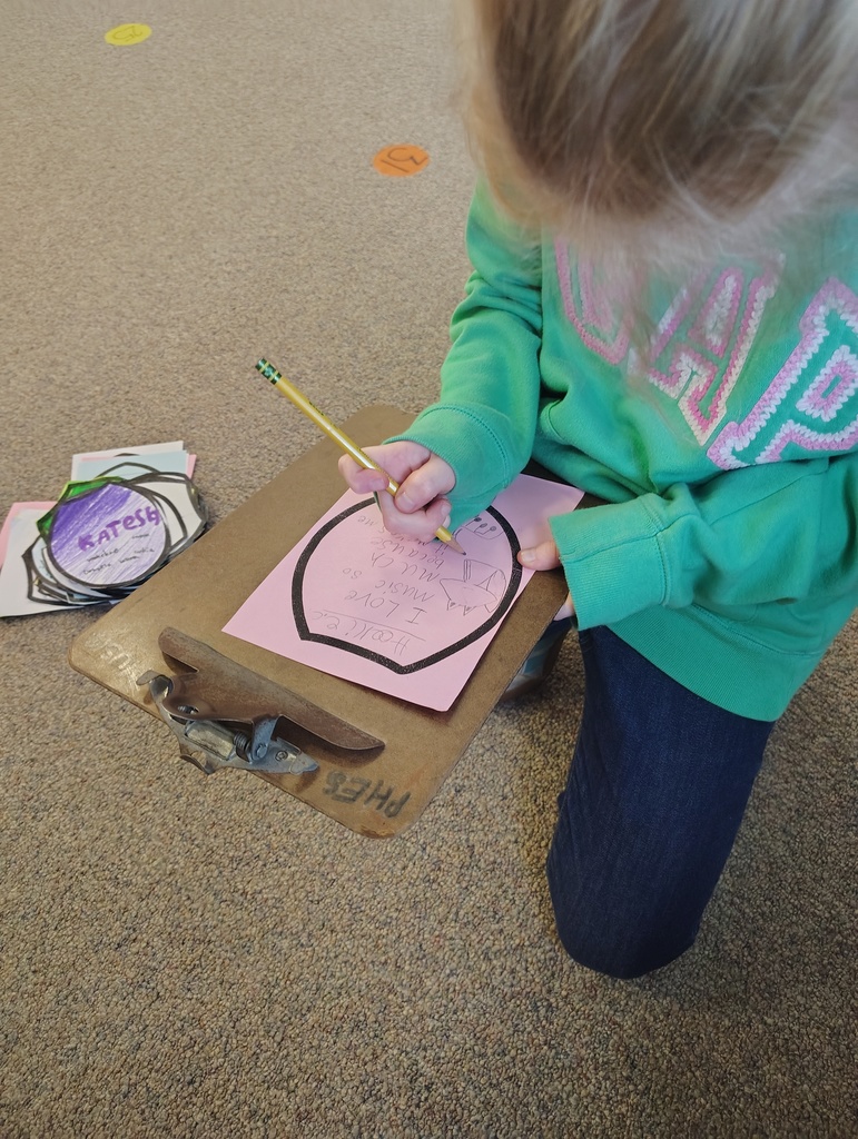 a girl student working on her flower petal