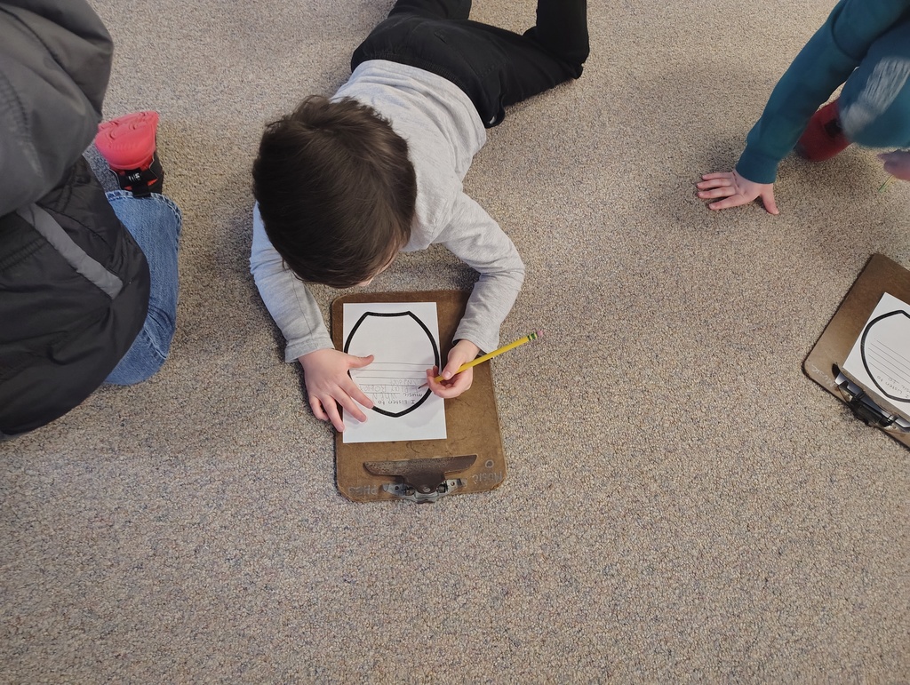 student working on his flower petal