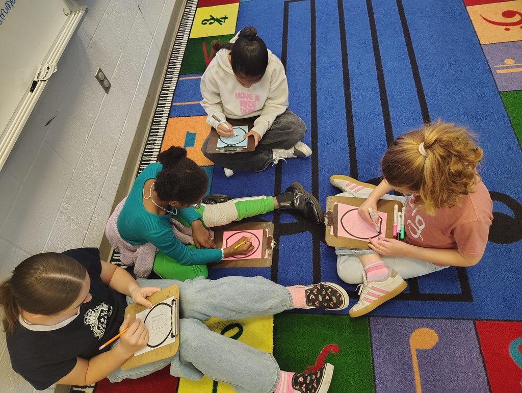 group of girl students working on their flower petal